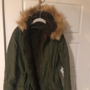 Green parka with faux fur hood